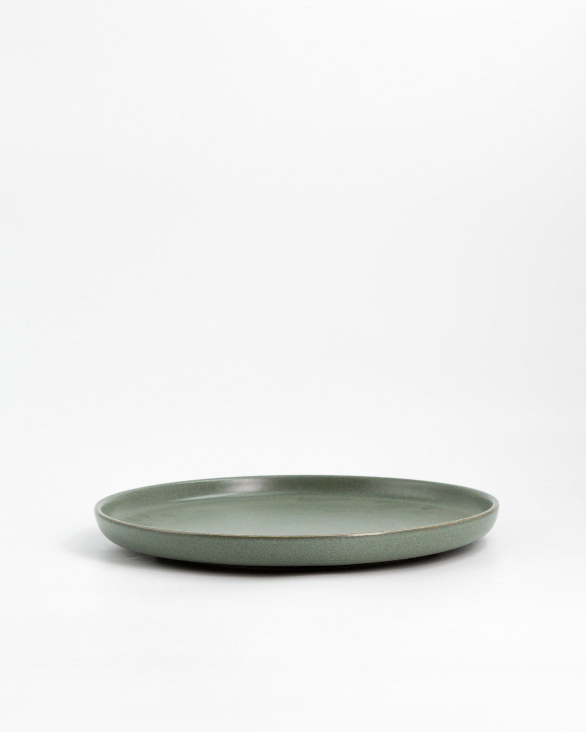 Tallrik Archi Lawn, olivgrön stengods 28 cm (bild 3) – från Norling Studio